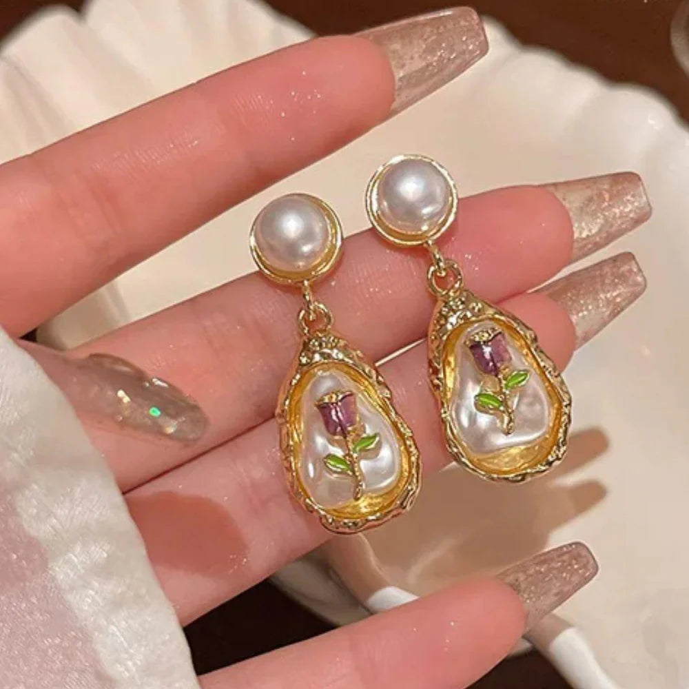 Pearl Drop Earrings with Encased Rose Design