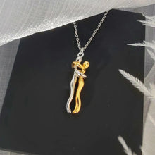 Dual-Tone Embrace Pendant Necklace