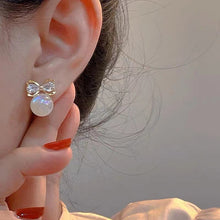 Crystal Bow & Pearl Stud Earrings – Elegant & Feminine Touch