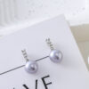 Crystal Bow & Pearl Stud Earrings – Elegant & Feminine Touch