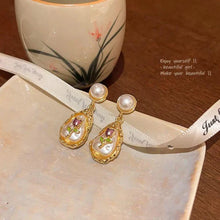 Pearl Drop Earrings with Encased Rose Design