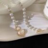 Vintage-Inspired Pearl Necklace with Heart Charm