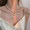 Vintage-Inspired Pearl Necklace with Heart Charm