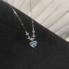Iridescent Crystal Heart Necklace with Diamond Accents