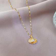 Elegant Gold Shell Pendant Necklace with Hidden Pearl