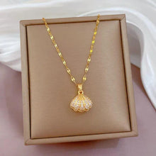 Elegant Gold Shell Pendant Necklace with Hidden Pearl