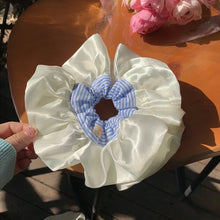 Elegant Pearl White Satin Scrunchie with Blue Striped Center